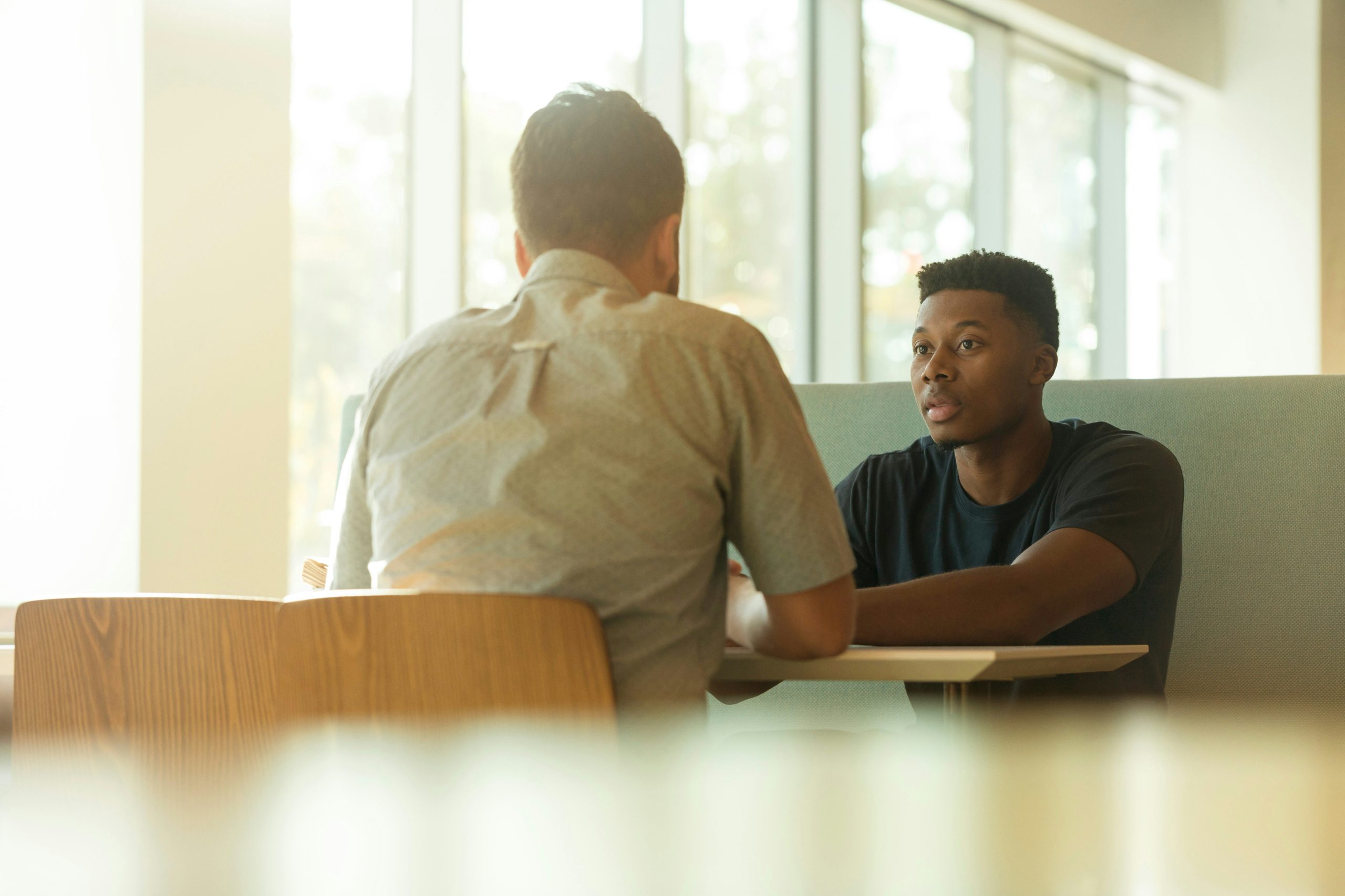 Cognitive behavior therapy. Two men talking